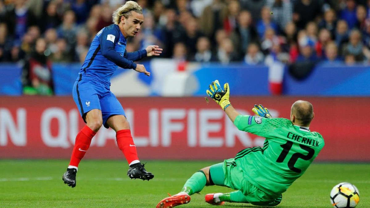 Antoine Griezmann mencetak gol pertama Prancis (Pascal Rossignol/Reuters)