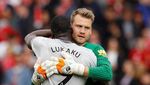 Setan Merah Redam Si Merah di Anfield