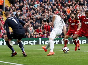 Setan Merah Redam Si Merah di Anfield