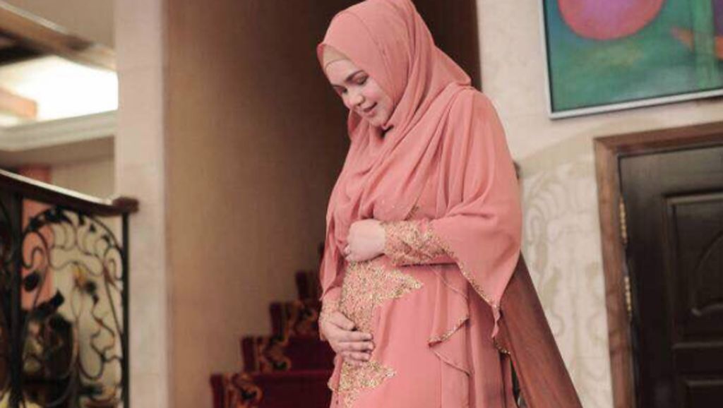 Hamil Setelah 11 Tahun Nikah, Siti Nurhaliza Pamer Perut Buncit