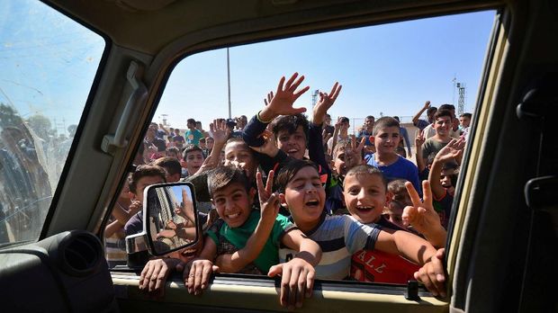 Dari Ruang Tamu, Warga Irak Menyebarkan Pesan Kedamaian