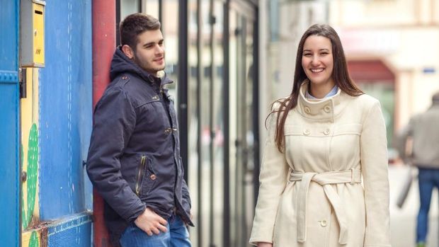 Group of young man flirting with women in city. Friendship, leisure, student's lifestyle, first love, communication concept