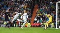 Tidak ada pemenang dalam laga Real Madrid kontra Tottenham Hotspur. Madrid mesti rela berbagi angka dengan Tottenham setelah mengakhiri laga dengan skor 1-1. Paul Hanna/Reuters.