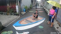 Foto: Saat Jalan Aspal di Depok Disulap Jadi Lukisan 3 Dimensi
