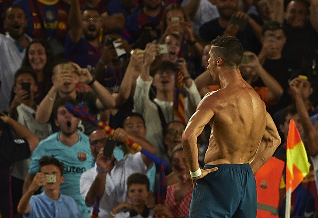 BARCELONA, SPAIN - AUGUST 13:  Cristiano Ronaldo of Real Madrid celebrates scoring his team's second goal during the Supercopa de Espana Supercopa Final 1st Leg match between FC Barcelona and Real Madrid at Camp Nou on August 13, 2017 in Barcelona, Spain.  (Photo by Manuel Queimadelos Alonso/Getty Images,)