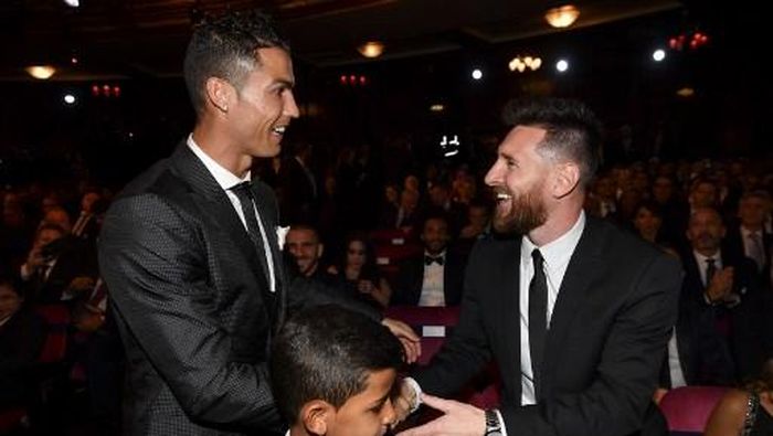JUDI ONLINE Cristiano Ronaldo dan Lionel Messi. (Foto: Ben STANSALL/AFP)