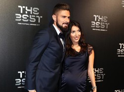 Jennifer Giroud merupakan istri dari Oliver Giroud. Pasangan ini menikah pada 2011. (Foto: Bryn Lennon/Getty Images)
