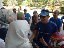 Tiba di Balai Kota Usai Lari, Sandiaga  Disambut Warga Bukit Duri