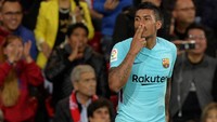Paulinho kemudian mengunci kemenangan Barca lewat golnya di masa injury time. Foto: Vincent West/Reuters