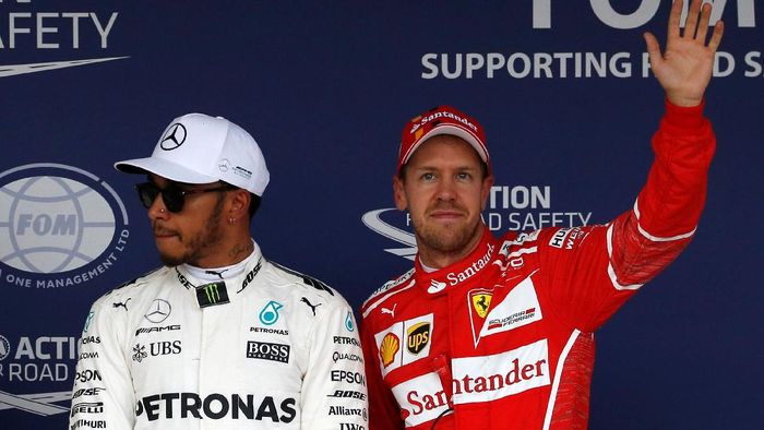 Lewis Hamilton bersama Sebastian Vettel (Foto: Toru Hanai/Reuters)