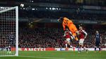 Tim Pelapis Loloskan Arsenal