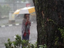 Berlindung dibalik payung