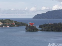 Cerita Senja di Pantai Holtekamp