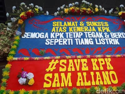 Karangan Bunga untuk KPK: Semoga Tetap Tegak Seperti Tiang Listrik