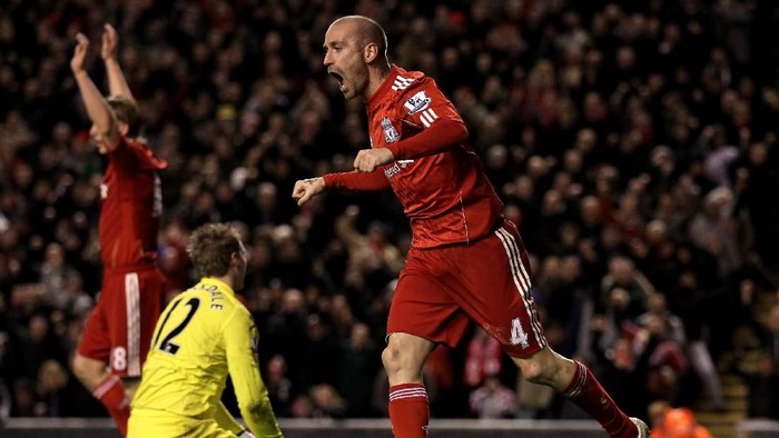Raul Meireles  Raul Meireles of Liverpool celebrates after John Pantsil of Fulham scored an own goal during the Barclays Premier League match between Liverpool and Fulham at Anfield on January 26, 2011 in Liverpool, England. (Photo by Alex Livesey/Getty Images)