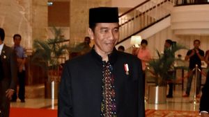 Foto: Jokowi Pakai Baju Berbahan Ulos untuk Resepsi Kahiyang-Bobby