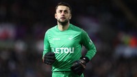 Lukasz Fabianski (kiper), Swansea City. Kiper paling sibuk pekan ini dengan membuat lima penyelamatan dalam hasil seri tanpa gol lawan Bournemouth. (Foto: Catherine Ivill/Getty Images)