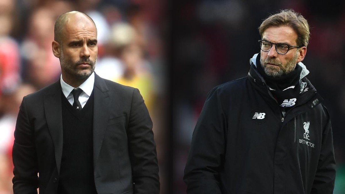 Juergen Klopp dan manajer Manchester City Josep Guardiola (Foto: Laurence Griffiths/Getty Images)