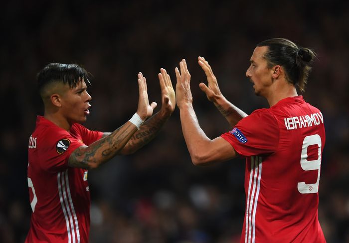 Manchester United MANCHESTER, ENGLAND - SEPTEMBER 29: Zlatan Ibrahimovic of Manchester United is congratulated by teammate Marcos Rojo after scoring the opening goal during the UEFA Europa League group A match between Manchester United FC and FC Zorya Luhansk at Old Trafford on September 29, 2016 in Manchester, England. (Photo by Laurence Griffiths/Getty Images)