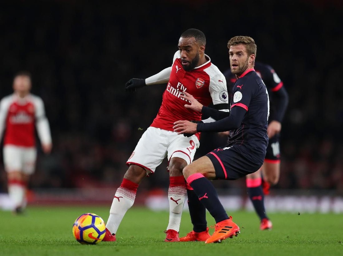Alexandre Lacazette akan absen saat Arsenal menghadapi Manchester United (Catherine Ivill/Getty Images)