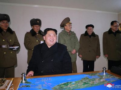 Foto: Ekspresi Bahagia Kim Jong-Un Berhasil Luncurkan Rudal Balistik