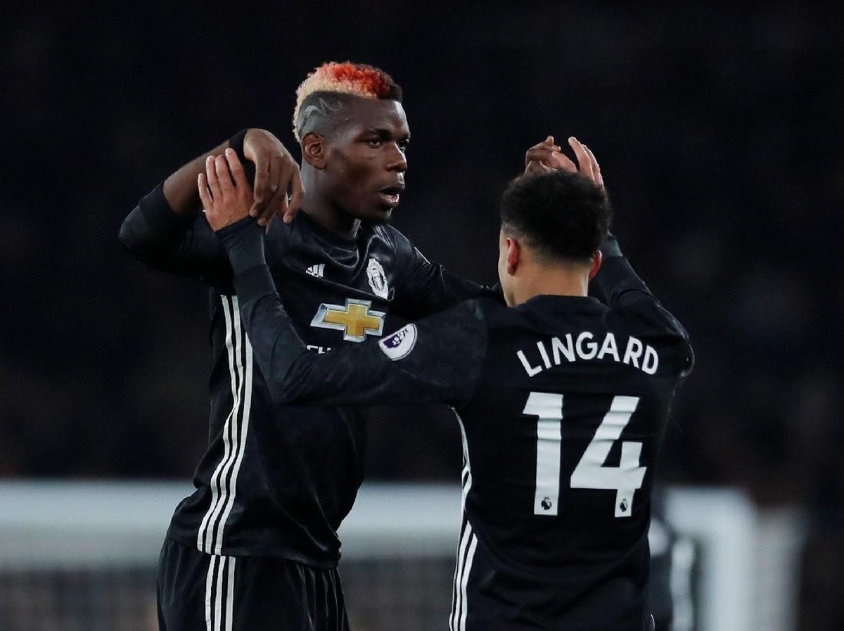 Paul Pogba merayakan gol bersama Jesse Lingard di laga Manchester United vs Arsenal (Foto: Andrew Couldridge/Reuters)