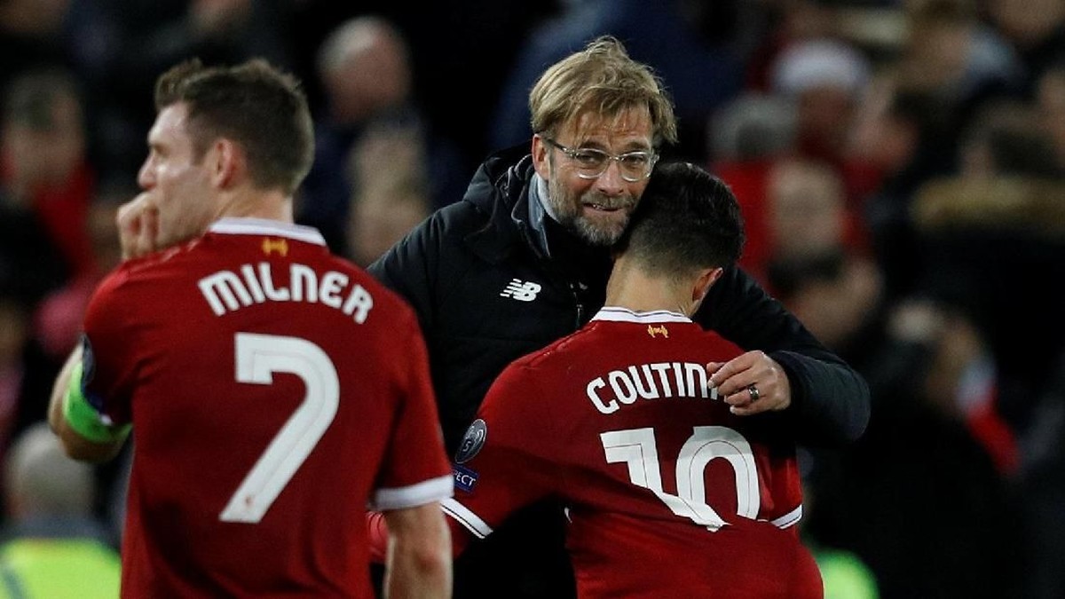 Juergen Klopp dan Philippe Coutinho (Phil Noble/Reuters)