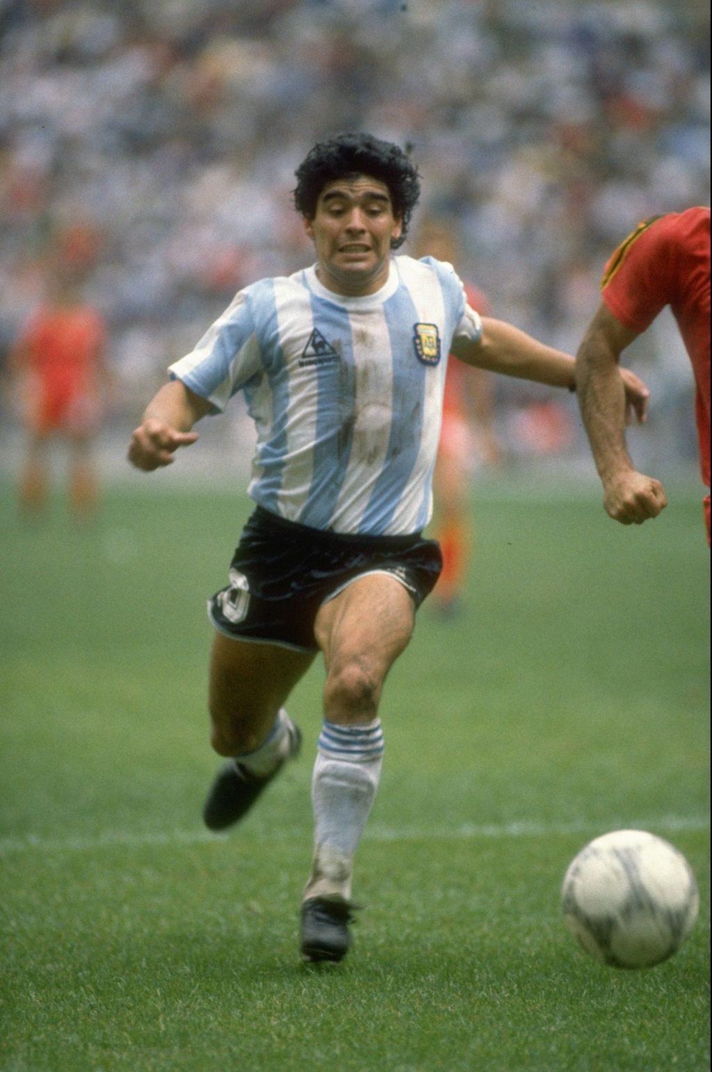 25 Jun 1986:  Diego Maradona of Argentina in action during the World Cup semi-final against Belgium at the Azteca Stadium in Mexico City. Argentina won the match 2-0.   Mandatory Credit: Mike King/Allsport