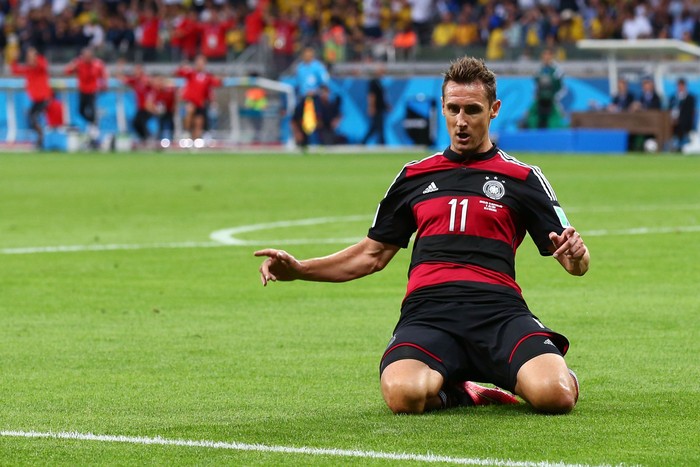 Miroslav Klose BELO HORIZONTE, BRAZIL - JULY 08: Miroslav Klose of Germany celebrates scoring his team's second goal during the 2014 FIFA World Cup Brazil Semi Final match between Brazil and Germany at Estadio Mineirao on July 8, 2014 in Belo Horizonte, Brazil. (Photo by Robert Cianflone/Getty Images)