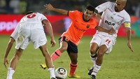 Barcelona harus berjuang hingga extra time ketika menghadapi Estudiantes di final 2009. Gol Lionel Messi di perpanjangan waktu memenangkan Barca 2-1. Foto: Ahmad Al-Rubaye/AFP