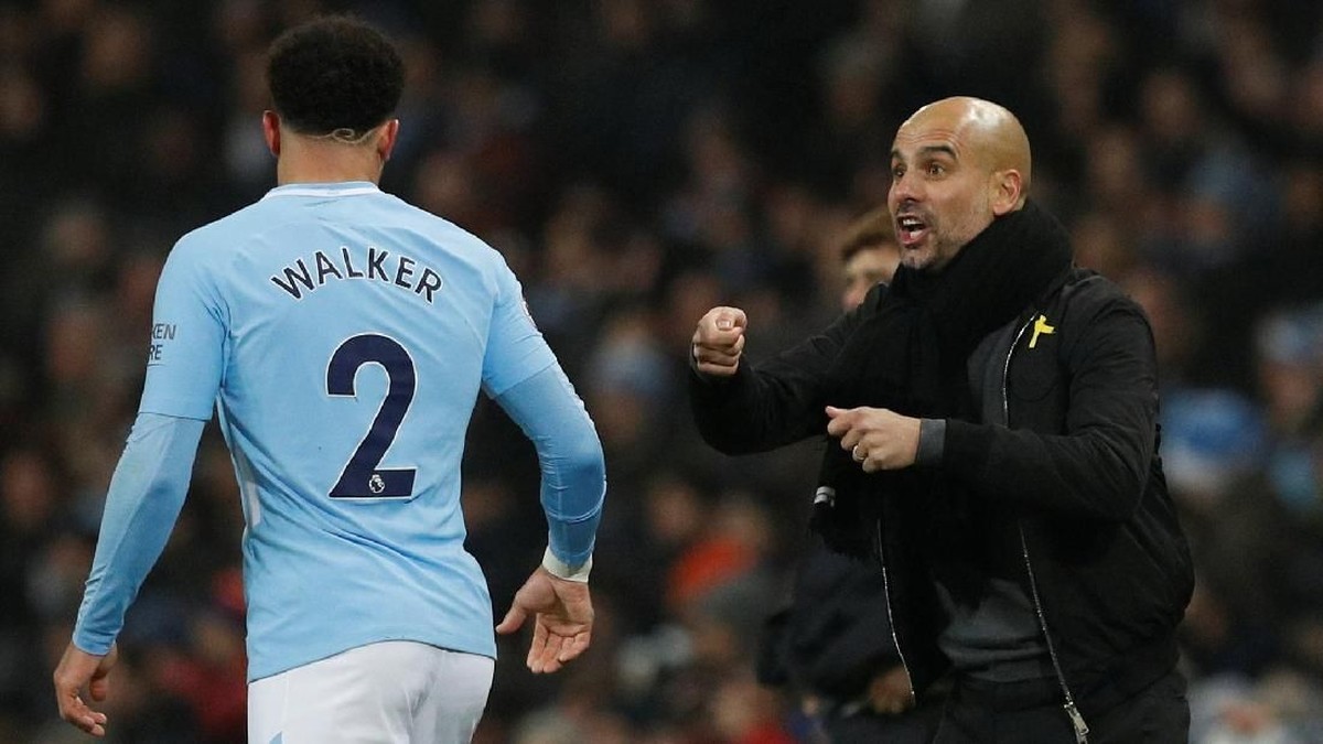Kyle Walker dan Pep Guardiola di salah satu laga Manchester City. (Foto: Phil Noble/Reuters)