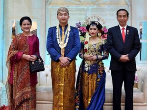 Potret Jokowi-Iriana Kondangan ke Pernikahan Pengawalnya