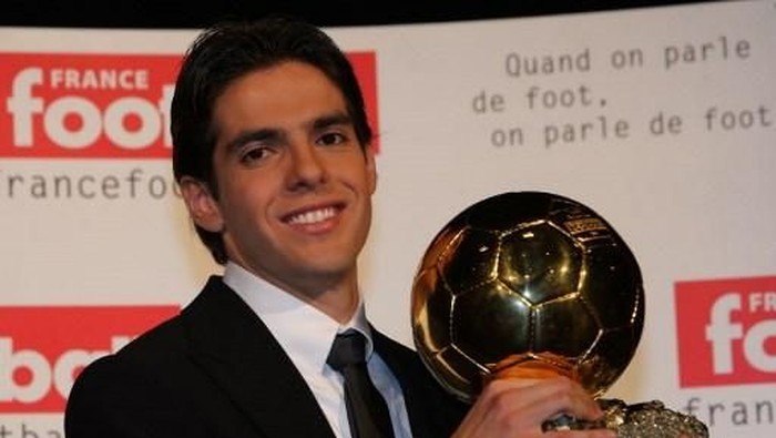 AC Milan's Brazilian midfielder Kaka poses with his trophy after being awarded as France Football's Player of the Year winning the prestigious Ballon d'Or award, 02 December 2007 in Boulogne-Billancourt outside Paris. Born under the name of Ricardo Izecson dos Santos Leite, he succeeds Italy's World Cup winning captain and defender Fabio Cannavaro and comes two years after the last Brazilian winner of the trophy, Barcelona's Ronaldinho. The 25-year-old Kaka notably played a starring role in AC Milan's triumphant Champions League campaign scoring 10 goals and setting up the winner for Filippo Inzaghi in the final against Liverpool. AFP PHOTO PIERRE VERDY / AFP PHOTO / PIERRE VERDY