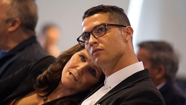 MADRID, SPAIN - NOVEMBER 07:  Cristiano Ronaldo of Real Madrid looks on with his mother Maria Dolores dos Santos Aveiro during his press conference after signing a new five-year contract with the Spanish club at the Santiago Bernabeu stadium on November 7, 2016 in Madrid, Spain.  (Photo by Denis Doyle/Getty Images)