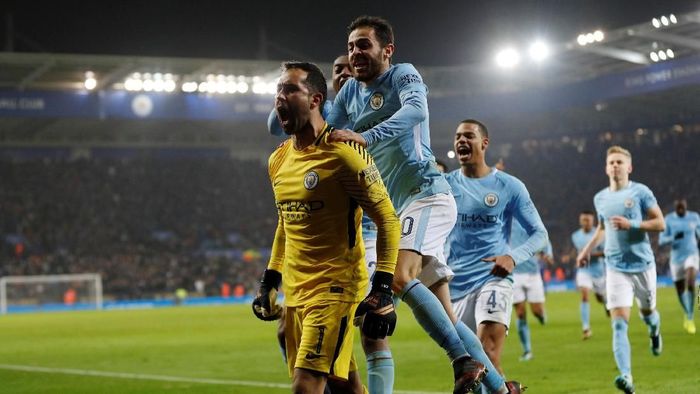 Manchester City mengalahkan Leicester City dalam adu penalti di perempatfinal Piala Liga Inggris (Darren Staples/Reuters) Manchester City mengalahkan Leicester City dalam adu penalti di perempatfinal Piala Liga Inggris (Darren Staples/Reuters)