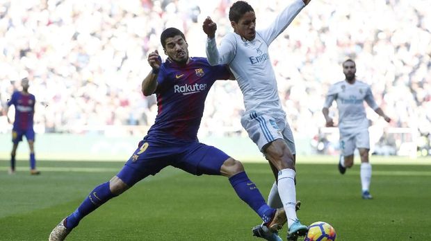 Raphael Varane (kanan) sudah menjadi salah satu pemain andalan di Real Madrid.