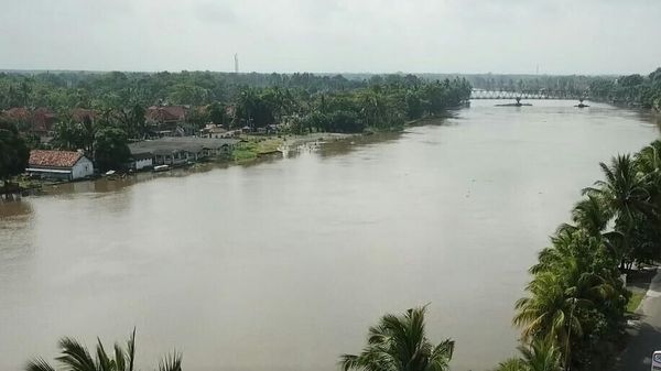 Foto: Penampakan Sungai Ogan yang Meluap Rendam 6 Kecamatan