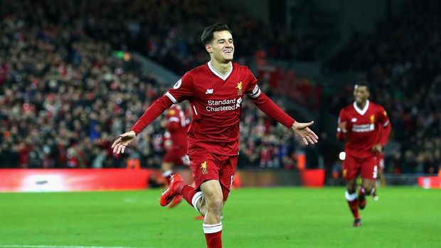 LIVERPOOL, ENGLAND - DECEMBER 26:  Philippe Coutinho of Liverpool scores his sides first goal during the Premier League match between Liverpool and Swansea City at Anfield on December 26, 2017 in Liverpool, England.  (Photo by Jan Kruger/Getty Images)