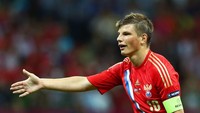 Andrey Arshavin sempat kuliah di departemen kimia tapi kemudian pindah ke desain mode dan lulus S2 dari bidang tersebut. (Shaun Botterill/Getty Images)