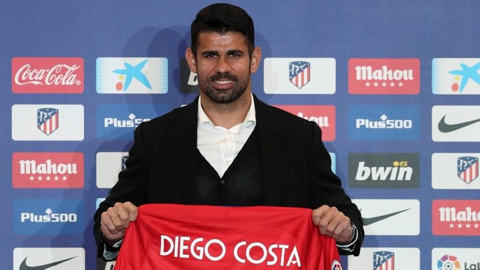 Diego Costa Atletico Madrid's soccer player Diego Costa poses with his jersey for the media at Wanda Metropolitano stadium in Madrid, Spain, December 31, 2017. REUTERS/Susana Vera