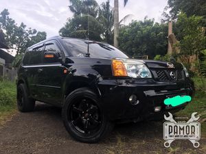 Black on Black X-Trail T30 si Simply Touring