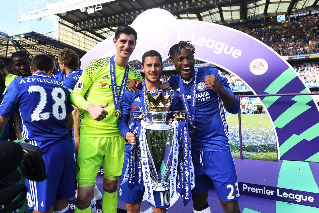 LONDON, ENGLAND - MAY 21: Thibaut Courtois of Chelsea, Eden Hazard of Chelsea and Michy Batshuayi of Chelse  pose with the Premier League Trophy after the Premier League match between Chelsea and Sunderland at Stamford Bridge on May 21, 2017 in London, England.  (Photo by Michael Regan/Getty Images)