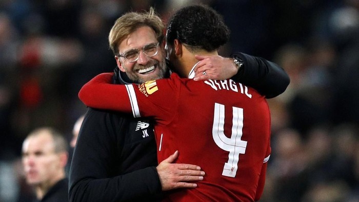 Soccer Football - FA Cup Third Round - Liverpool vs Everton - Anfield, Liverpool, Britain - January 5, 2018   Liverpool manager Juergen Klopp celebrates with Virgil van Dijk at the end of the match   REUTERS/Phil Noble