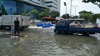 Foto: Banjir Landa Singapura Usai Hujan Deras