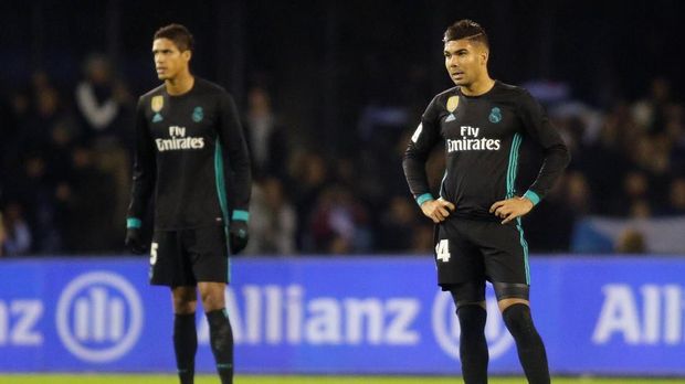 Raphael Varane menegaskan tak akan menyerah dalam perburuan gelar La Liga.