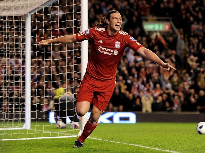 LIVERPOOL, ENGLAND - APRIL 11:  Andy Carroll of Liverpool celebrates scoring his team's third goal during the Barclays Premier League match between Liverpool and Manchester City at Anfield on April 11, 2011 in Liverpool, England.  (Photo by Michael Regan/Getty Images)