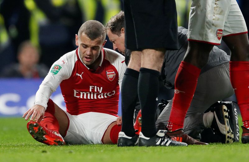 Soccer Football - Carabao Cup Semi Final First Leg - Chelsea vs Arsenal - Stamford Bridge, London, Britain - January 10, 2018   Arsenal's Jack Wilshere receives medical attention after sustaining an injury    REUTERS/David Klein    EDITORIAL USE ONLY. No use with unauthorized audio, video, data, fixture lists, club/league logos or 