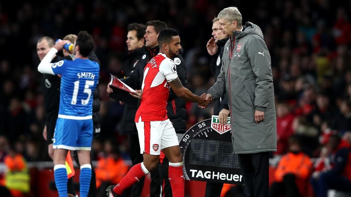 Arsene Wenger ingin Theo Walcott bertahan di Arsenal (Foto: Clive Rose/Getty Images)