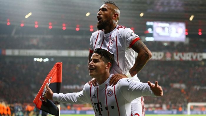 Bayer Leverkusen vs Bayern Munich Soccer Football - Bundesliga - Bayer Leverkusen vs Bayern Munich - BayArena, Leverkusen, Germany - January 12, 2018 Bayern Munichs James Rodriguez celebrates scoring their third goal with Arturo Vidal REUTERS/Wolfgang Rattay DFL RULES TO LIMIT THE ONLINE USAGE DURING MATCH TIME TO 15 PICTURES PER GAME. IMAGE SEQUENCES TO SIMULATE VIDEO IS NOT ALLOWED AT ANY TIME. FOR FURTHER QUERIES PLEASE CONTACT DFL DIRECTLY AT + 49 69 650050
