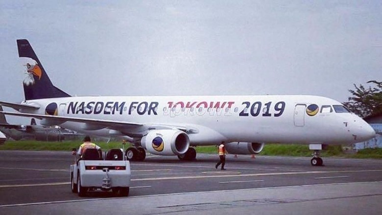 Nasdem For Jokowi 2019 di Badan Pesawat Milik Surya Paloh
